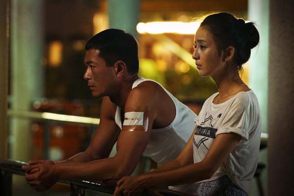 Louis Koo et Tong Liya dans Wild City (2015)