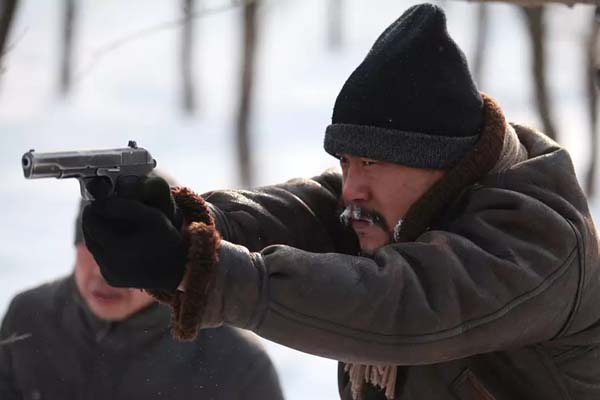 Liao Fan dans Black Coal (2014)