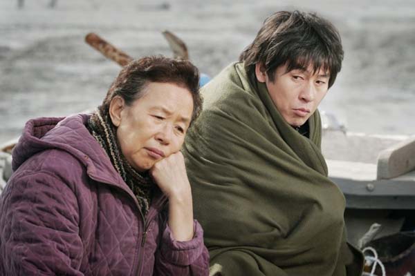 Sol Kyung-gu et Na Moon-hee dans Cruel Winter Blues (2006)