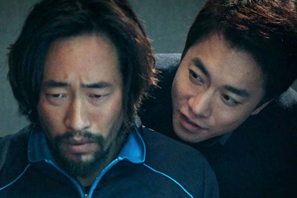 Ryoo Seung-bum et Choi Gwi-hwa dans The Net (2016)