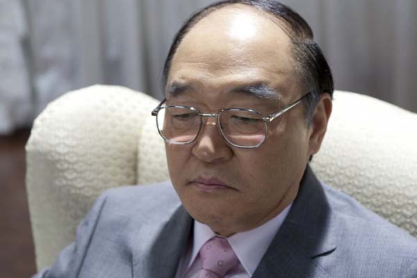 Jang Gwang dans 26 Years (2012)