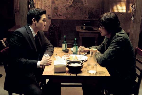 Kwon Sang-woo et Yoo Ji-tae dans Running Wild (2006)