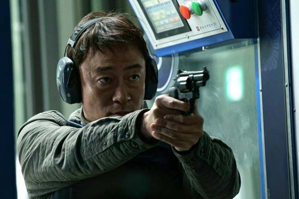 Lee Sung-min dans The Beast (2018)