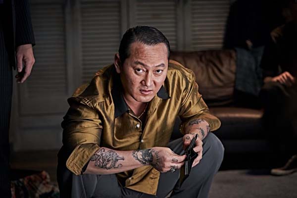 Jung Man-sik dans Beasts Clawing at Straws (2020)